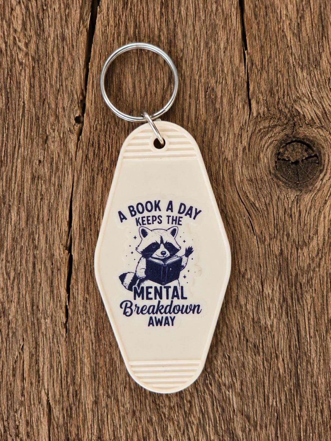 Motel Keychain | Funny Reading Raccoon Book Lover Accessory