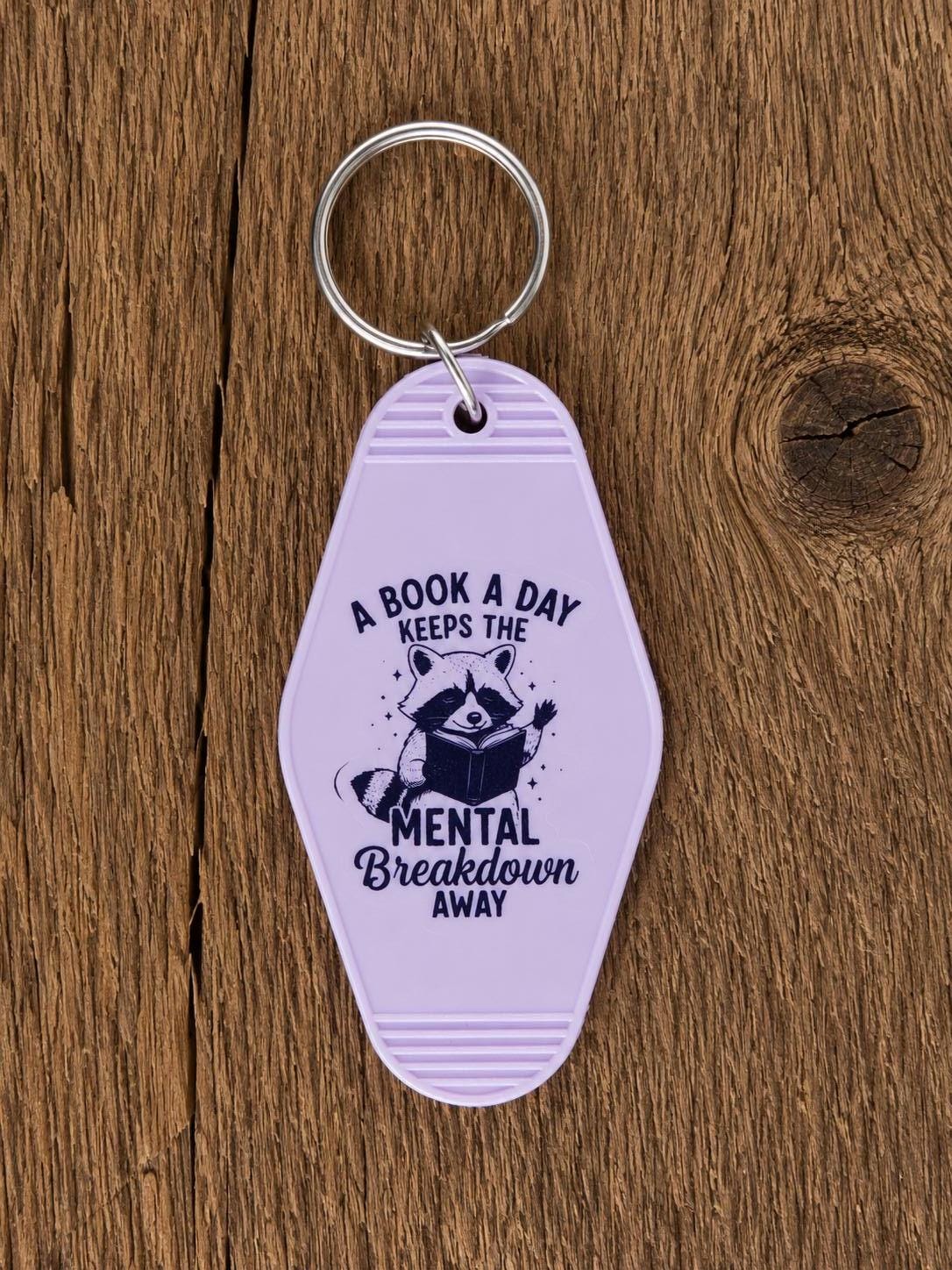 Motel Keychain | Funny Reading Raccoon Book Lover Accessory